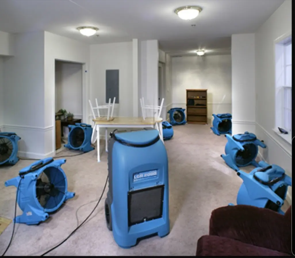 Air movers and dehumidifier setup for Water Damage Restoration in Grayson Valley